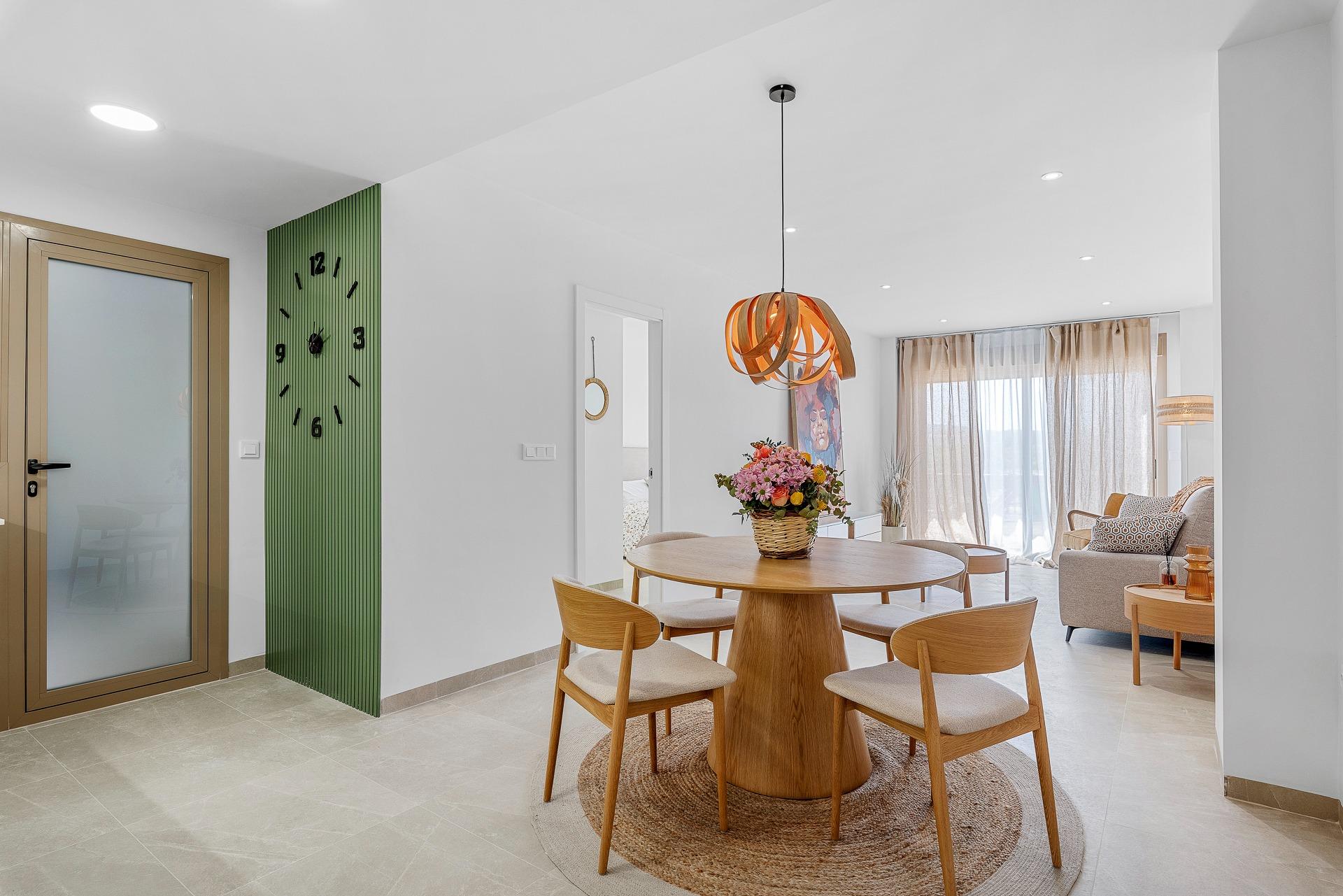 Bright, modern open-plan dining and living area in a 3-bedroom penthouse with terrace and open views in Jacarilla