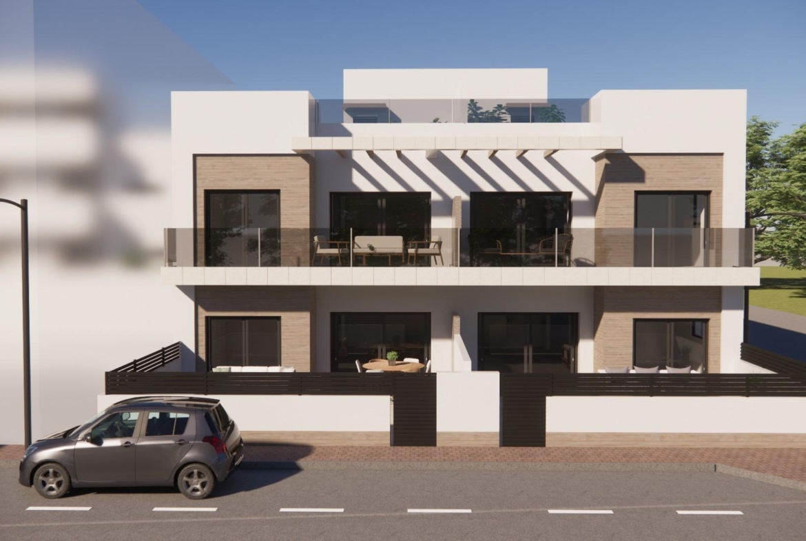 Modern new build 2-bedroom top floor apartment in Rojales with spacious terraces and sleek, sunlit exterior design.
