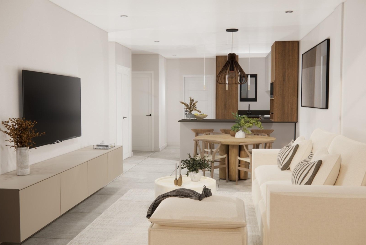 Bright modern living area with elegant open-plan kitchen in 2 bedroom ground floor apartment in Rojales, Costa Blanca South.