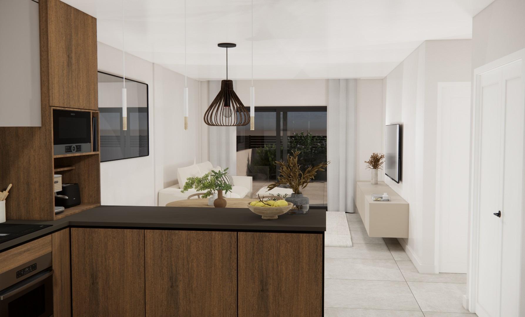 Bright modern open-plan kitchen and living area in a 2-bedroom ground floor apartment with terrace in Rojales, Costa Blanca South.