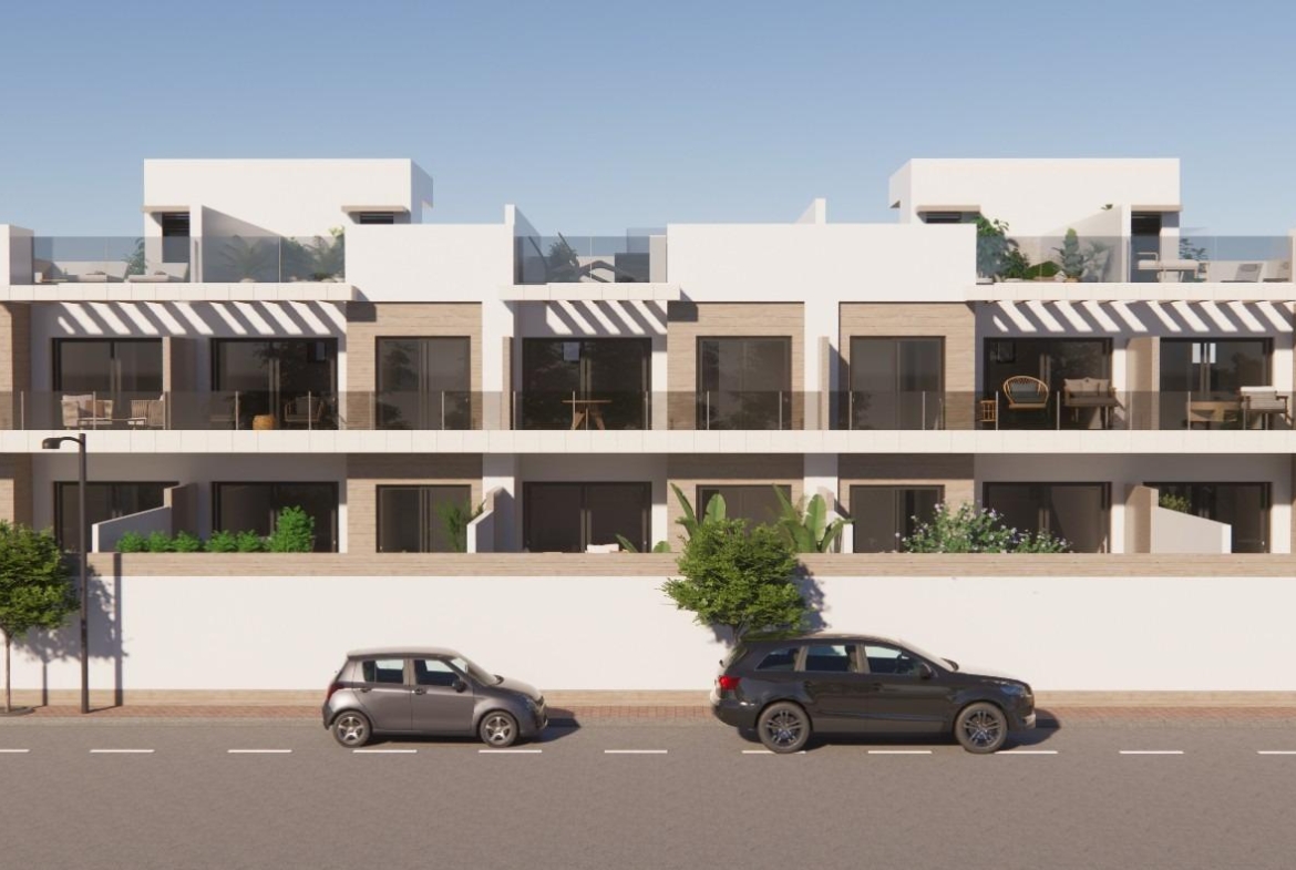 Modern new build 2-bedroom ground floor apartment with spacious terraces and sleek white facade in sunny Rojales, Costa Blanca South.