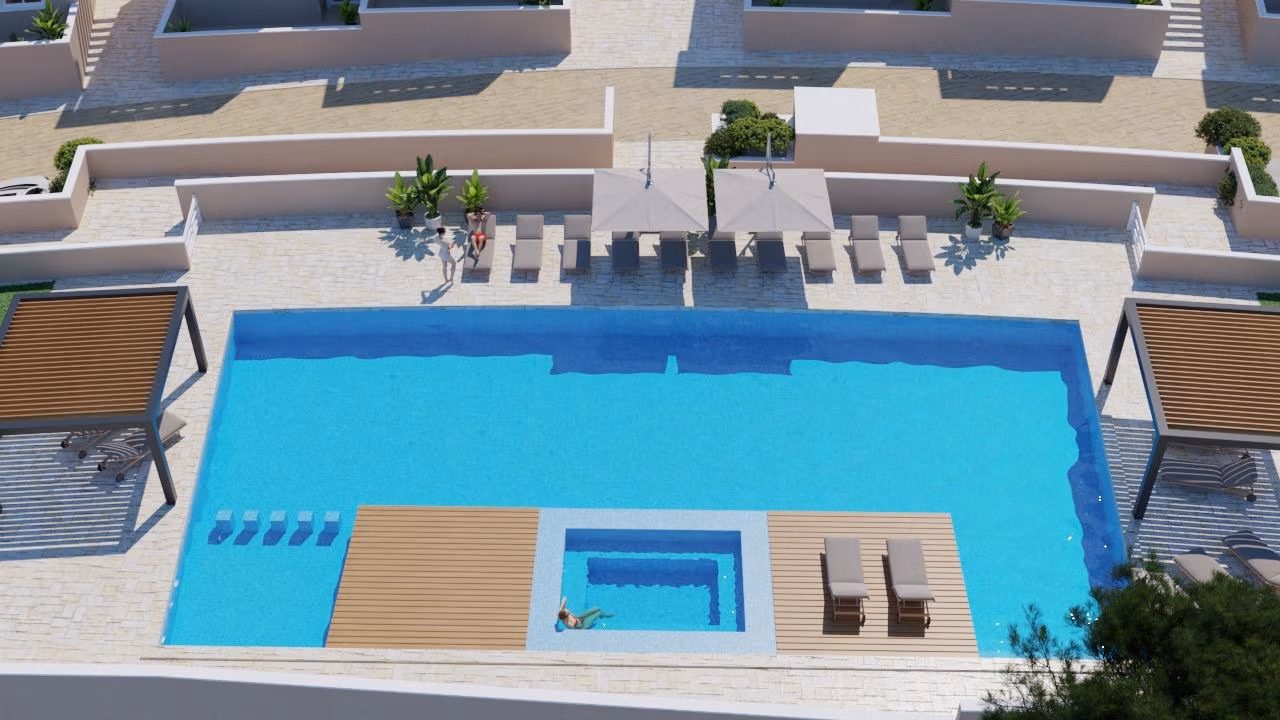 New-Build-Bungalows-in-Lo-Romero-Golf-Resort-Pilar-de-la-Horadada-3 Sun-drenched infinity pool with loungers and shaded pergolas at luxury 3-bedroom top floor apartment, Lo Romero Golf, Pilar de la Horadada.
