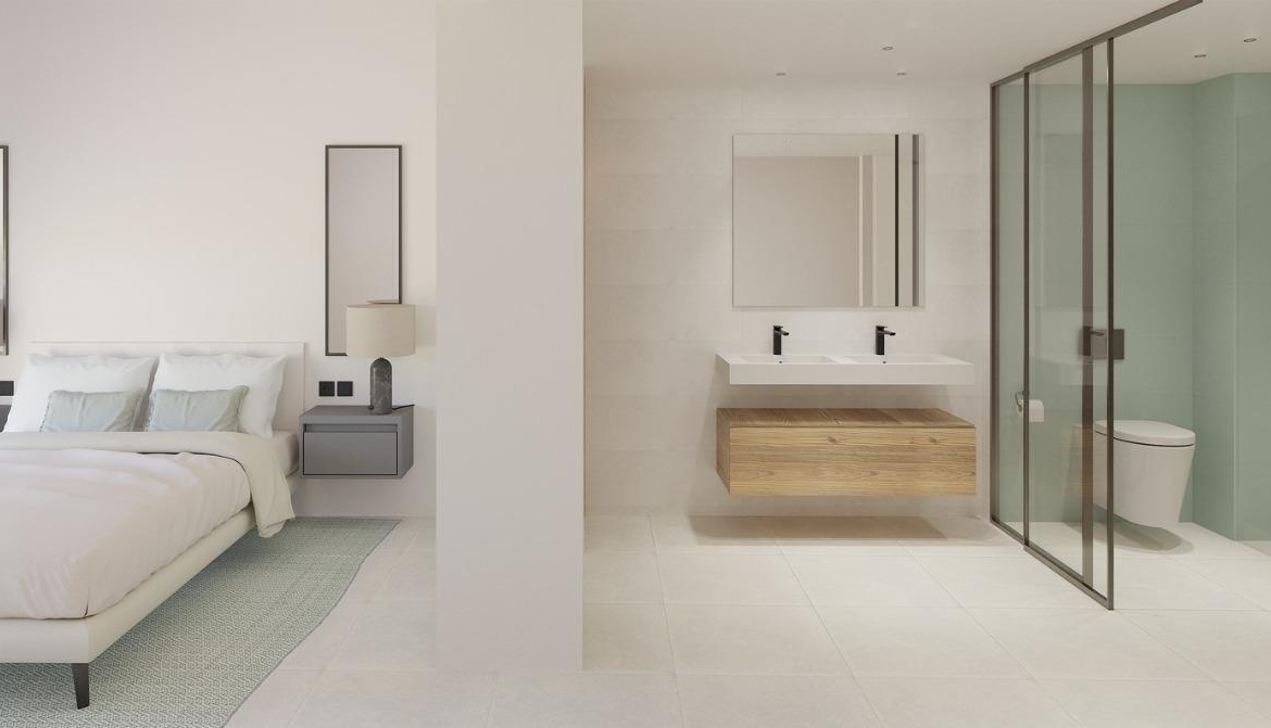 Bright modern top floor bedroom with sleek bathroom in luxury new build apartment in La Mata, Torrevieja