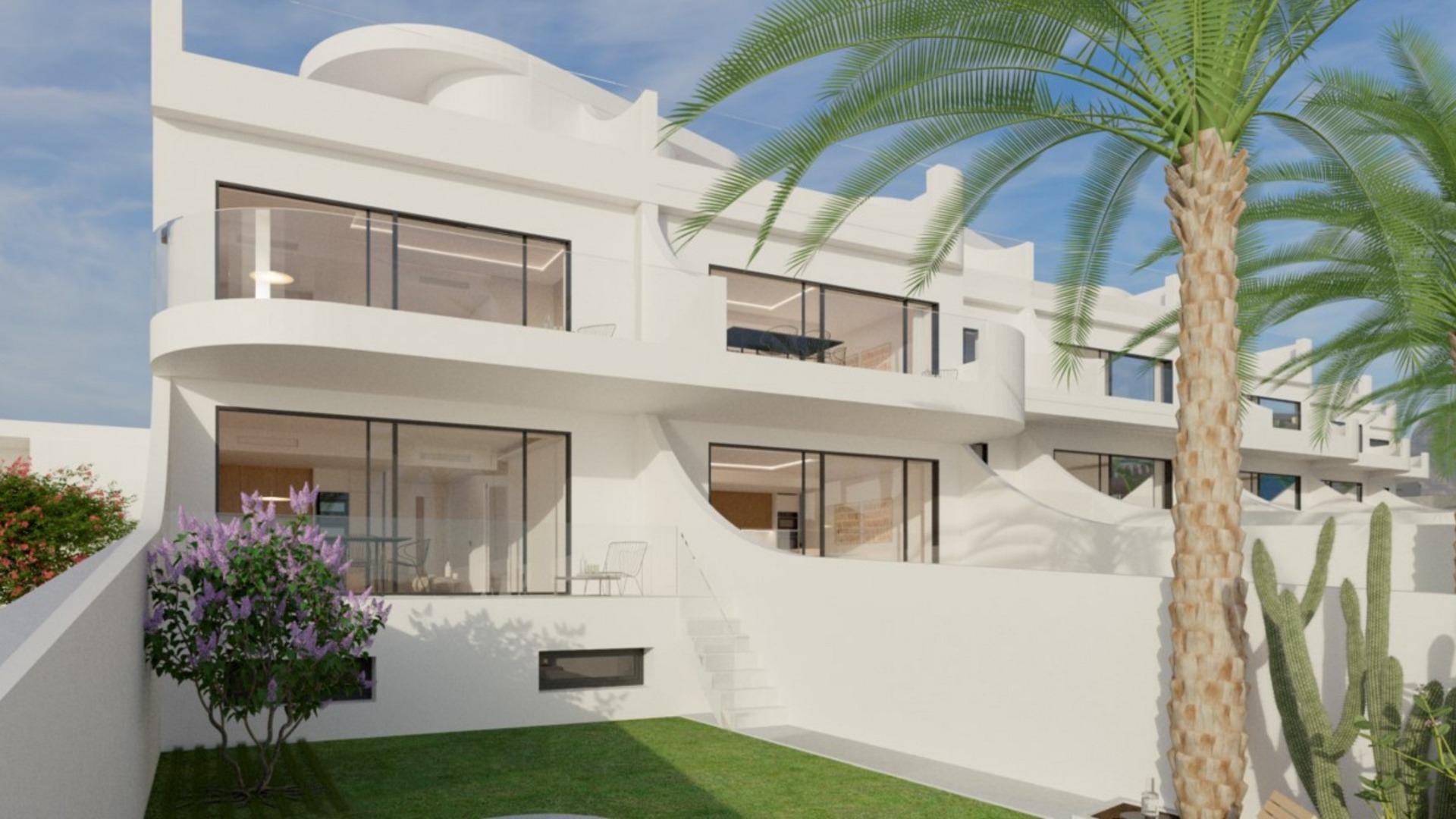 Modern luxury top floor apartment with spacious terraces and sea views in sunlit La Mata, Torrevieja.