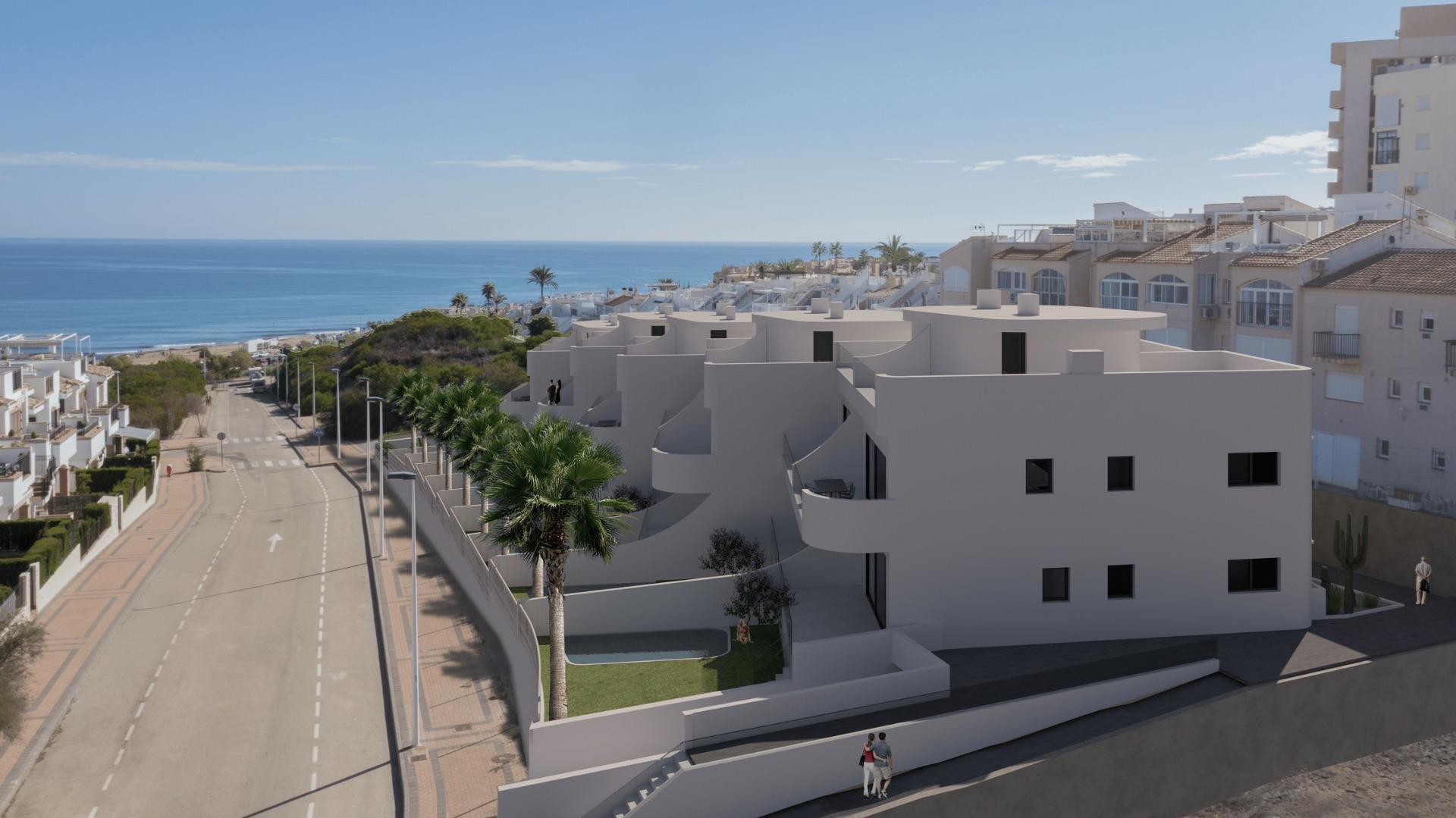 Modern luxury top floor apartment building in La Mata, Torrevieja with bright terraces and stunning sea views.