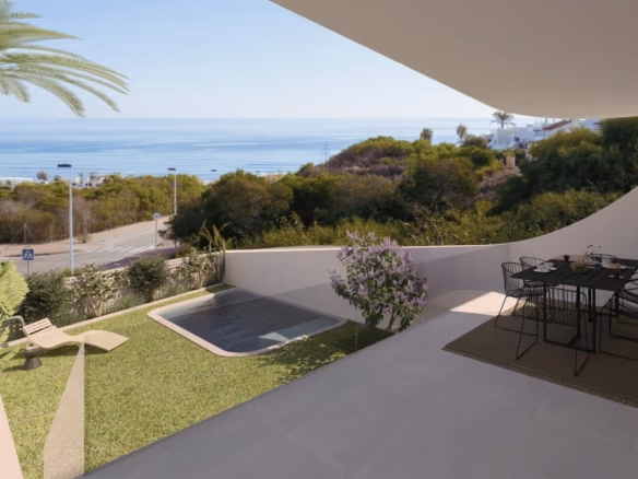 Sun-drenched ground floor apartment terrace with private garden and panoramic sea views in La Mata, Torrevieja.
