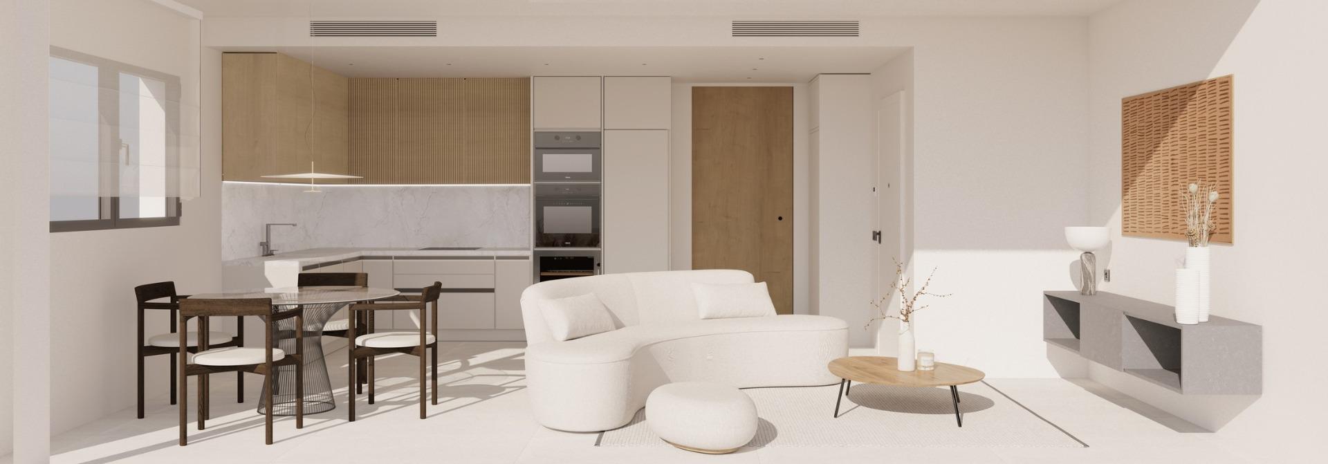Bright open-plan living and dining area with modern kitchen in luxury top floor apartment in La Mata, Torrevieja