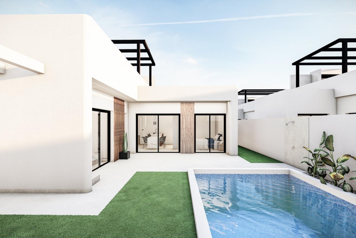 Modern Mediterranean single-storey villa in Roldán with a sleek private pool and sunlit minimalist exterior terrace.