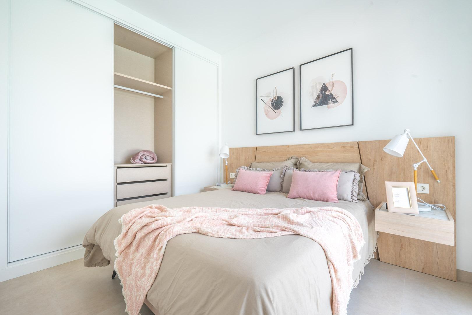 Bright, elegant bedroom with soft pastel accents in a Mediterranean new build single-storey villa in Roldán, Torre-Pacheco