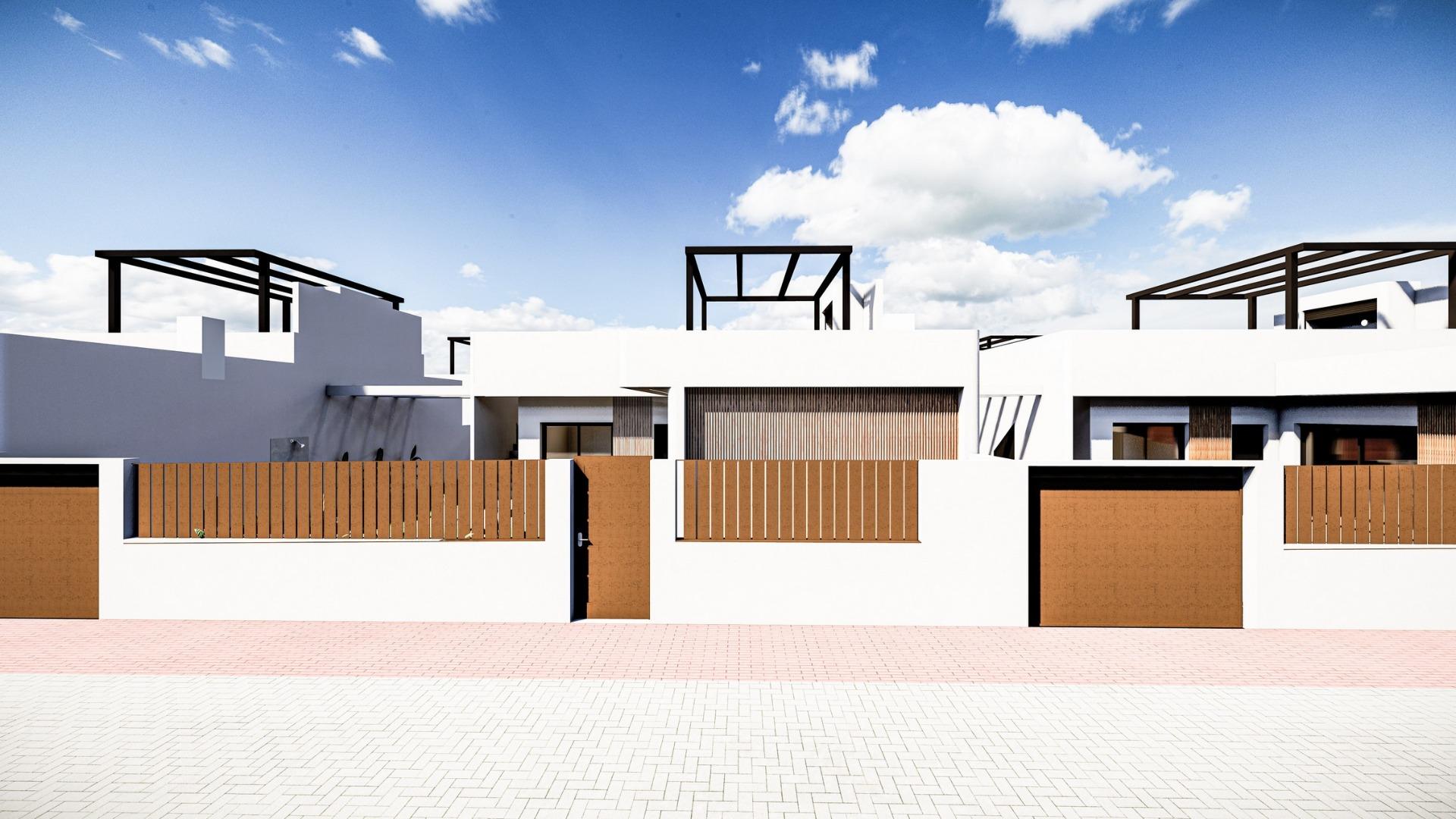 Modern Mediterranean single-storey villa exterior with sleek white walls and wood accents in sunlit Roldán, Torre-Pacheco.