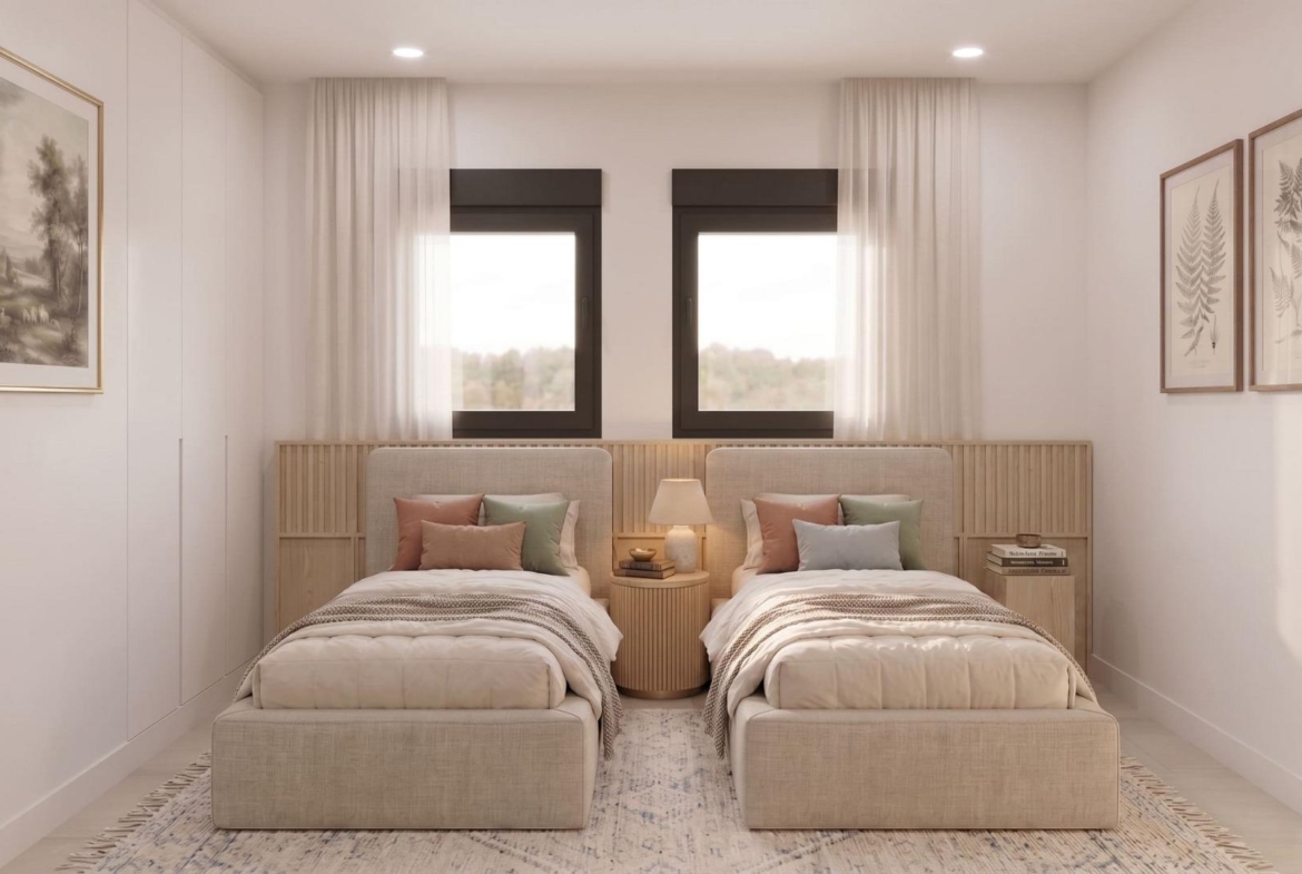 Bright, elegant twin bedroom with plush bedding, soft natural light, and tasteful artwork in a single-storey villa in Lorca, Costa Cálida.