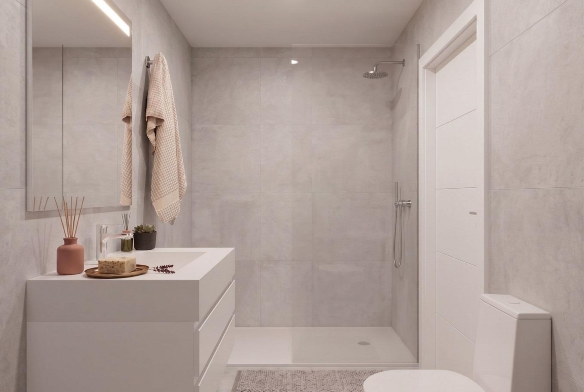 Minimalist, bright bathroom with modern fixtures in elegant new build single-storey villa in Lorca, Costa Cálida.