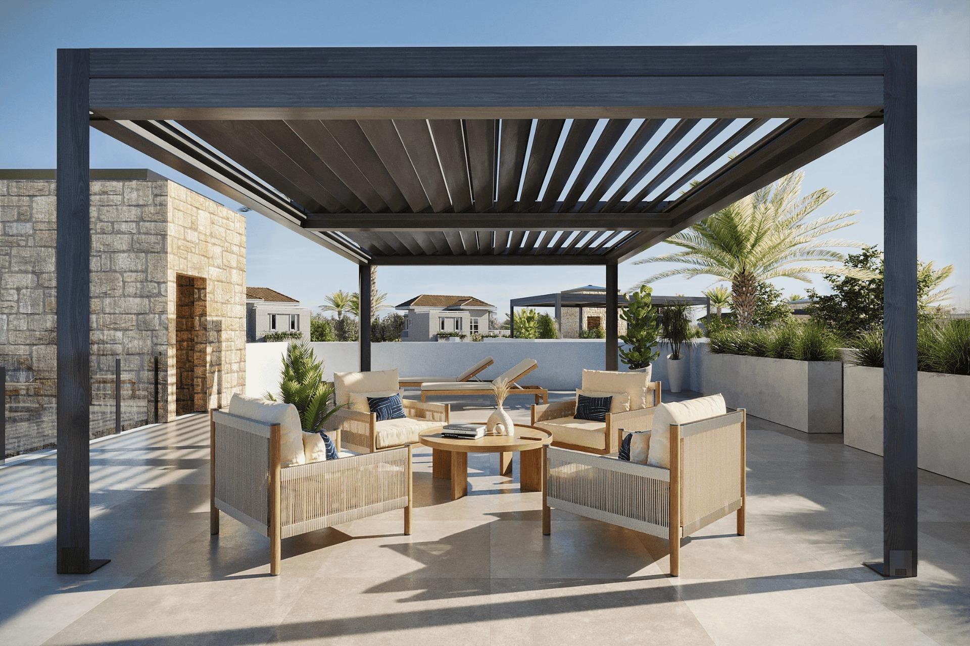 Spacious sun-drenched terrace with elegant loungers and shaded pergola at new build single-storey villa in Lorca, Costa Cálida
