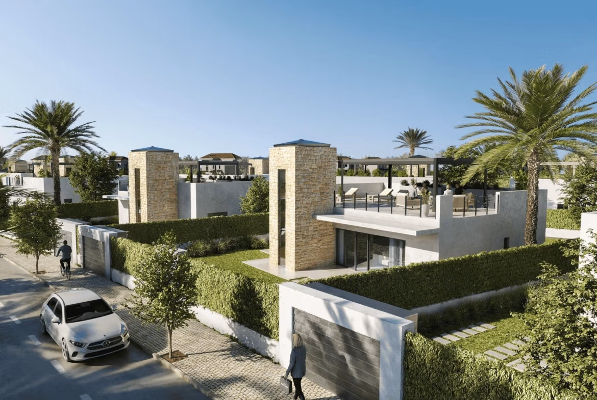 New-Build-Mediterranean-Villas-on-Large-Plots-in-Lorca-Costa-Calida-5 Spacious elegant single-storey villa in Lorca featuring a sun-drenched rooftop terrace surrounded by lush landscaping and palm trees.