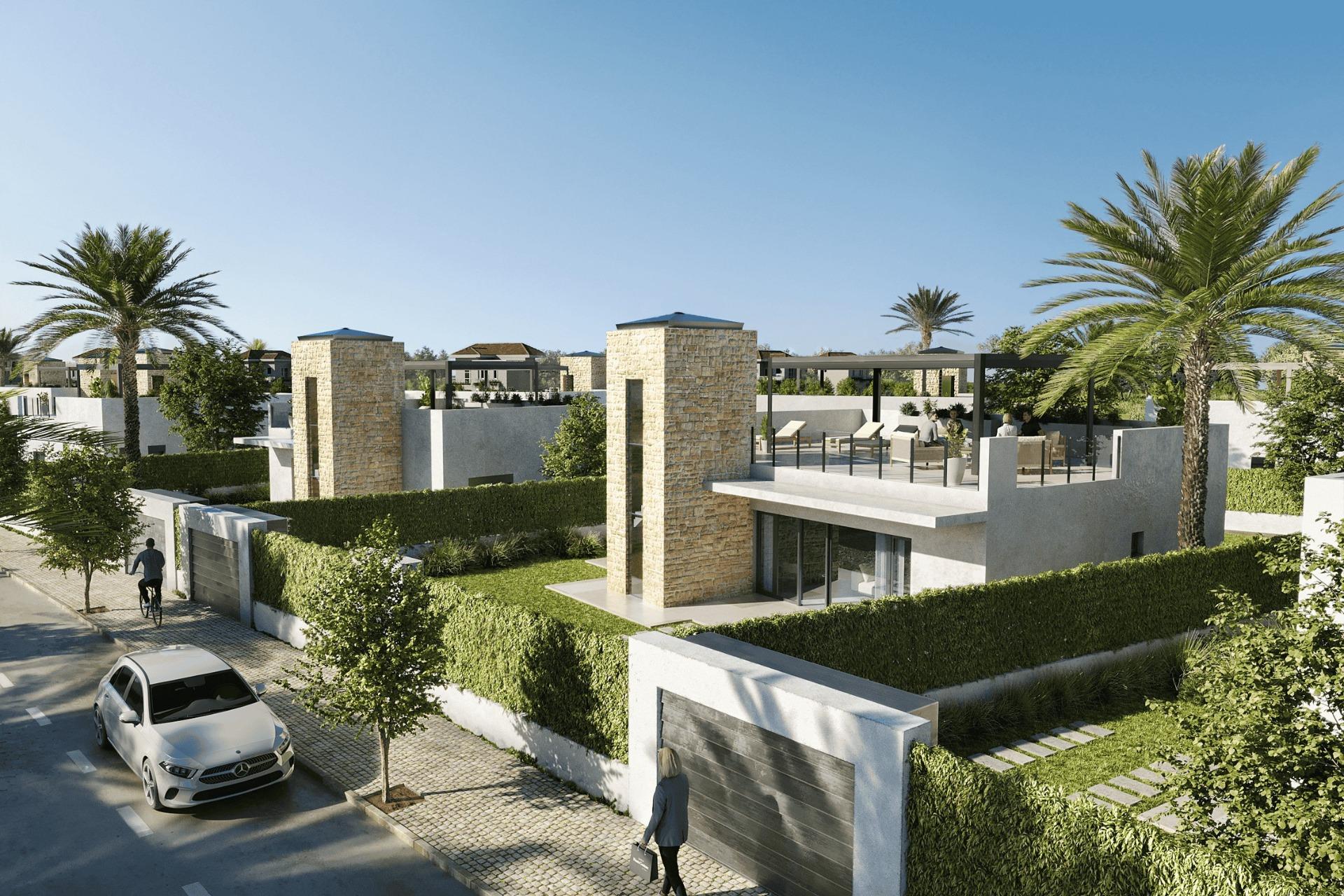 Spacious elegant single-storey villa in Lorca featuring a sun-drenched rooftop terrace surrounded by lush landscaping and palm trees.