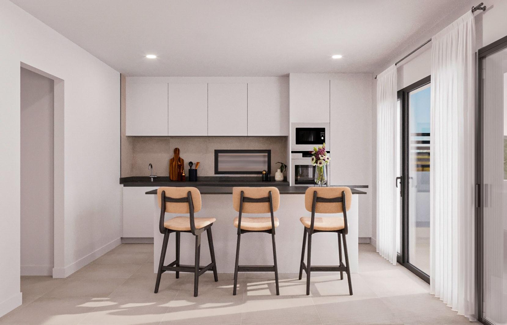Bright modern kitchen with sleek cabinetry and breakfast bar in elegant single-storey villa, Lorca, Costa Cálida.