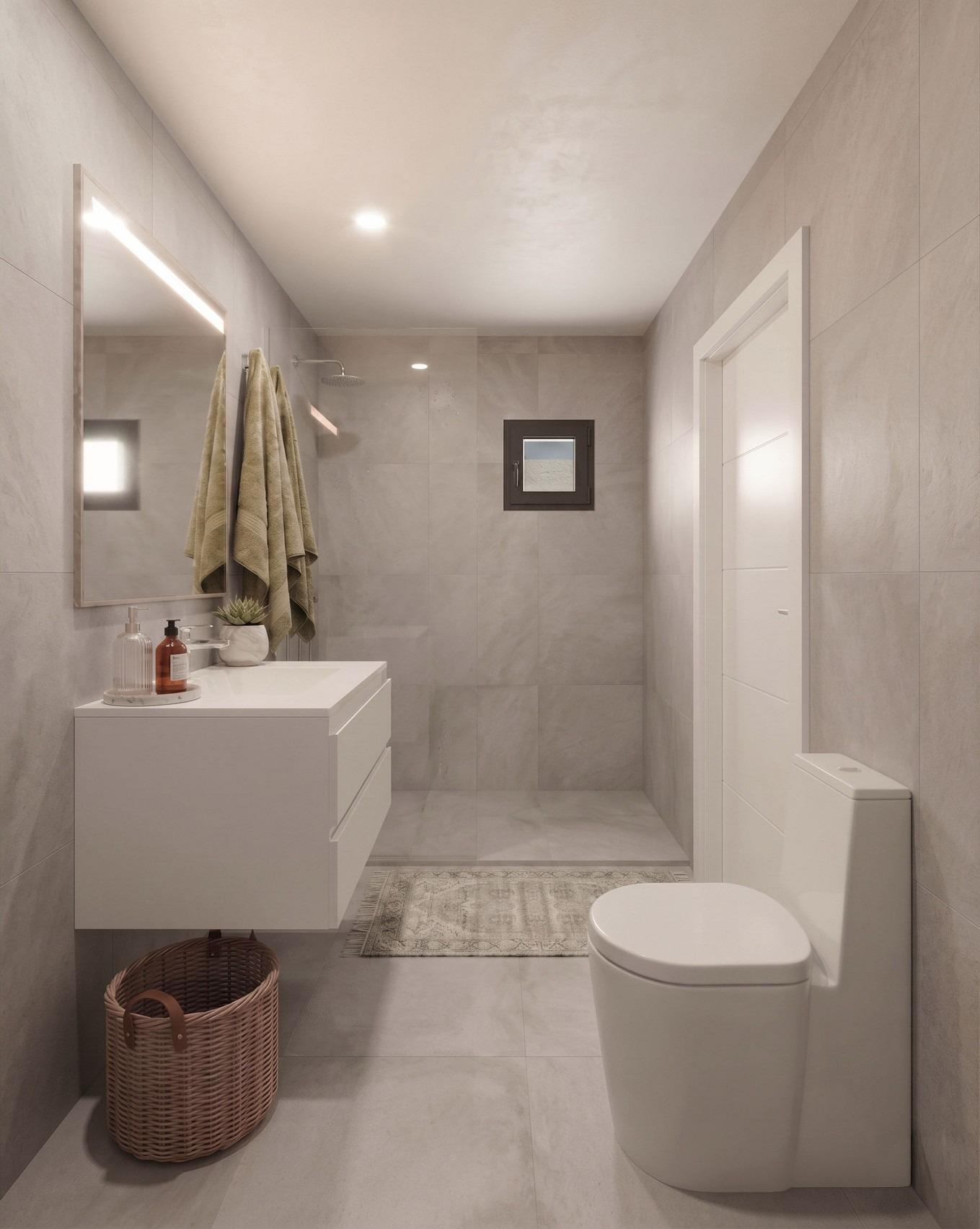 Bright, modern bathroom with sleek fixtures and walk-in shower in elegant new build single-storey villa in Lorca, Costa Cálida