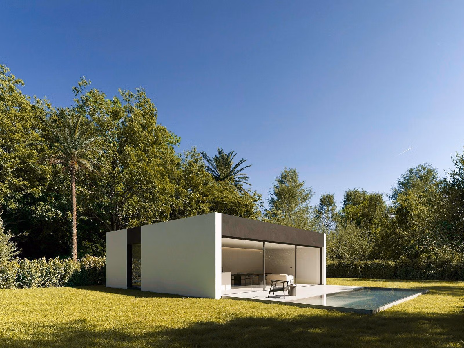 Elegant minimalist single-storey villa with sleek covered terrace and private pool set in lush greenery in Benidorm.