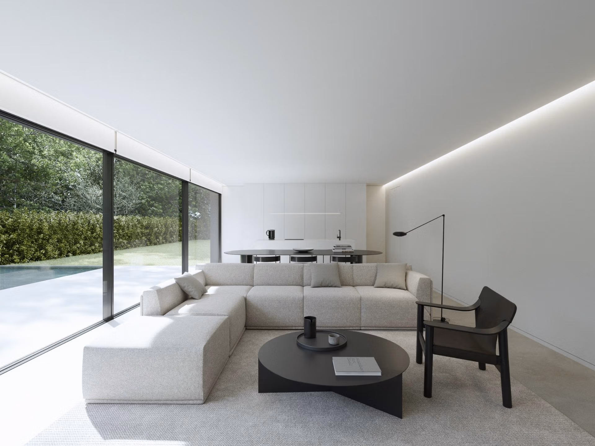 Bright, minimalist living room with sleek furniture and floor-to-ceiling windows overlooking the private pool of a new build Benidorm villa.