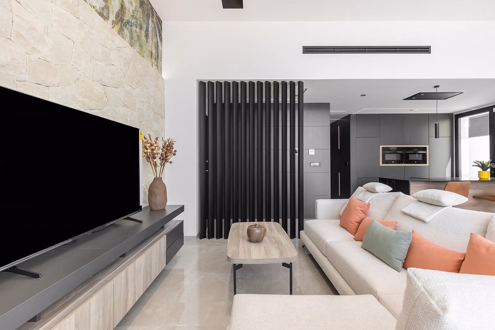 New-Build-One-Story-Villas-with-Private-Pool-in-Torrevieja-18 Modern, bright open-plan living area with sleek kitchen in a luxury single-storey villa in Los Balcones, Torrevieja