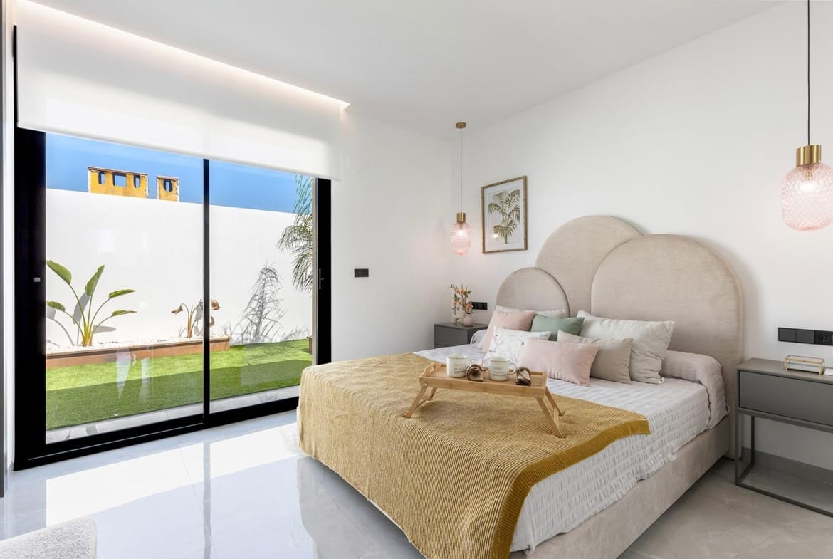 Bright and elegant bedroom in a key-ready single-storey villa with garden views in Los Balcones, Torrevieja