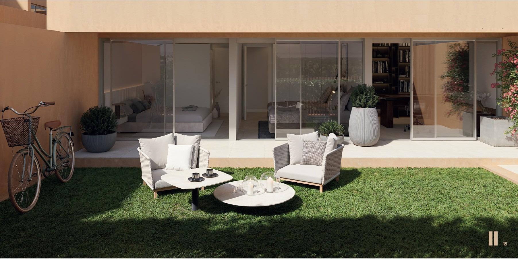 Modern sunlit terrace with comfortable seating and garden in new build residential apartments, Los Balcones, Torrevieja.