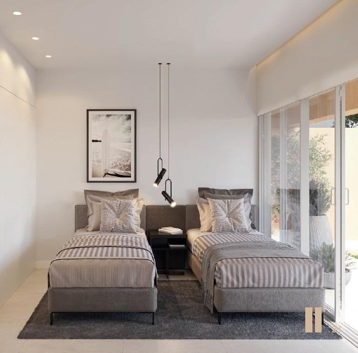 Bright and modern twin bedroom with sleek decor and terrace access in new build residential apartments in Los Balcones, Torrevieja