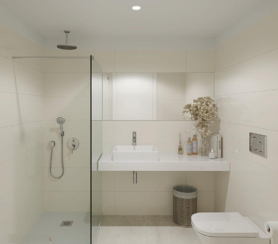 Bright modern bathroom with sleek walk-in shower and minimalist fixtures in new build residential apartments, Los Balcones, Torrevieja