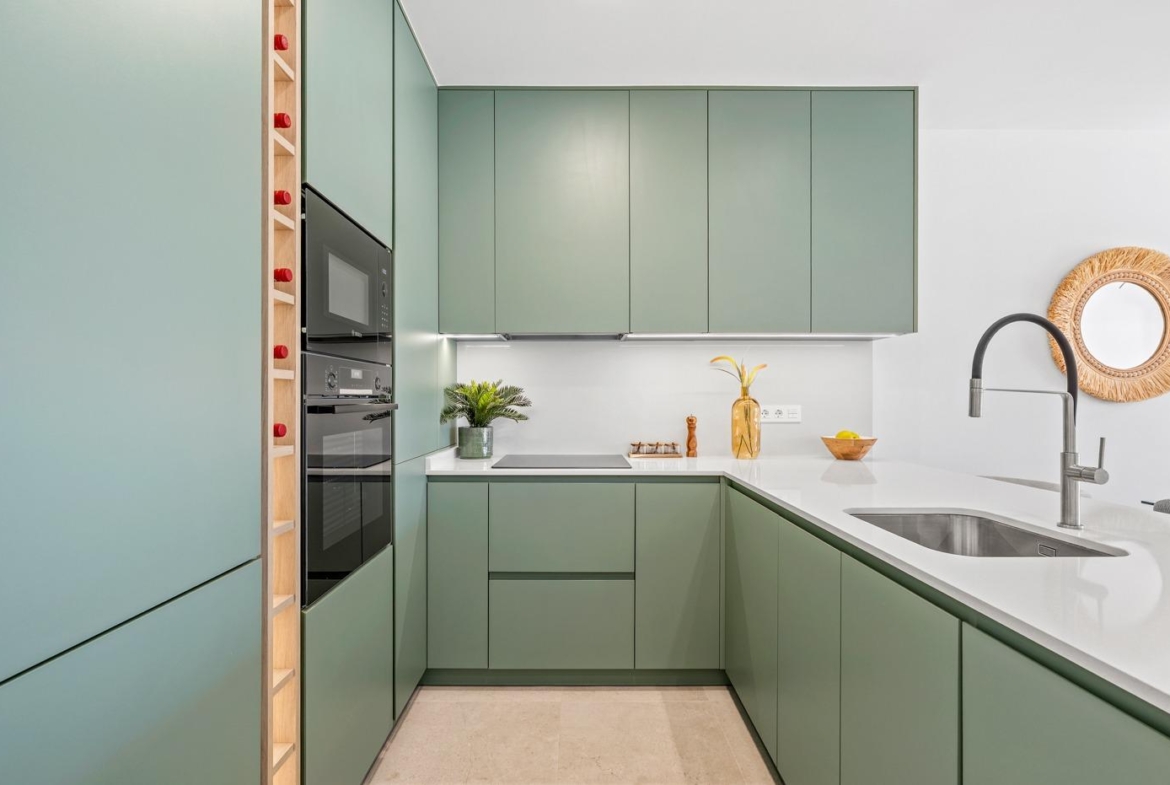Modern sunlit kitchen with sleek cabinetry in bright new build 2-bedroom first floor apartment, Serena Golf, Los Alcazares