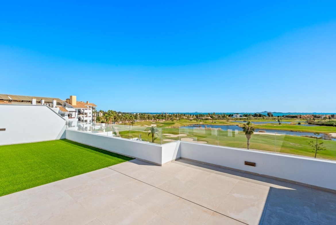 Spacious sun-drenched terrace overlooking lush Serena Golf course in bright new build 2-bedroom first floor apartment, Los Alcazares