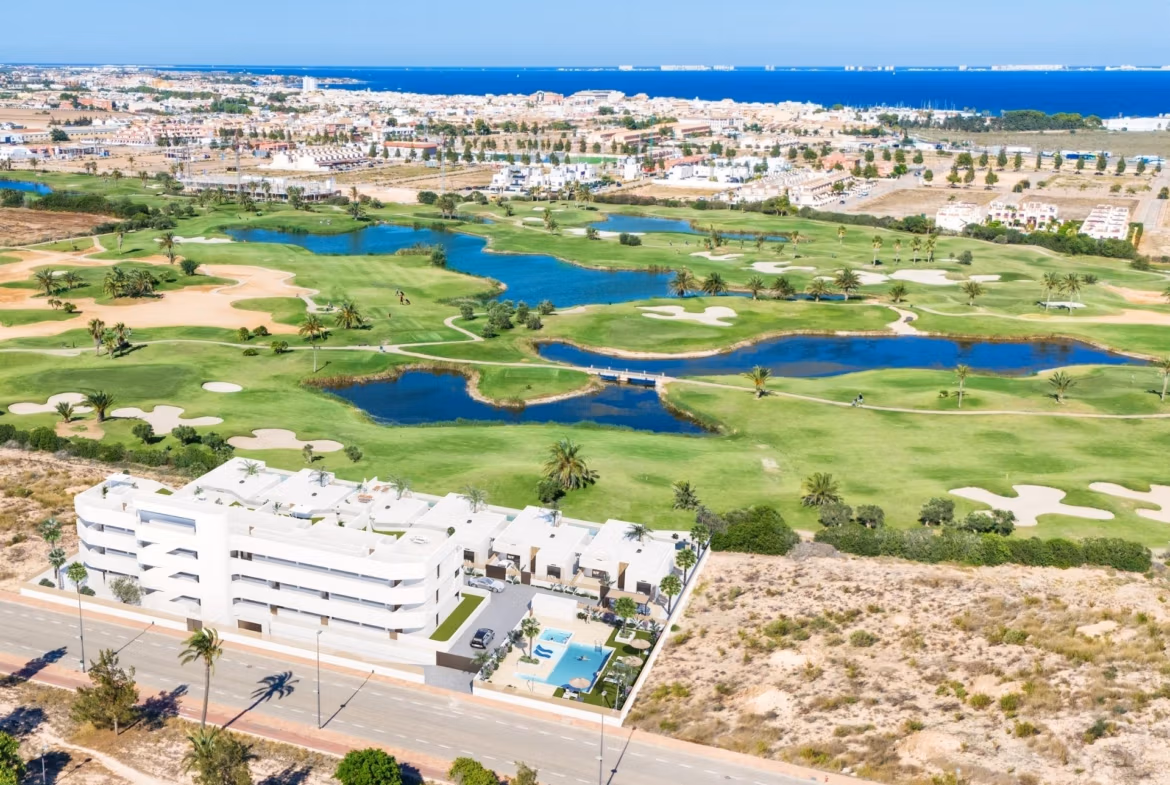 Modern new build 2-bedroom ground floor apartment with private garden, pool, and stunning golf course views in Serena Golf, Los Alcazares.