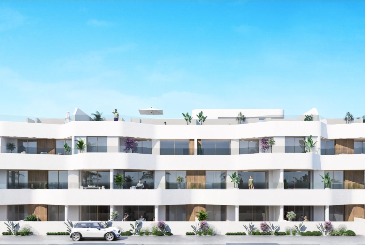 Modern bright three-story apartment building with spacious terraces in Serena Golf, Los Alcazares, new 2-bedroom first floor units