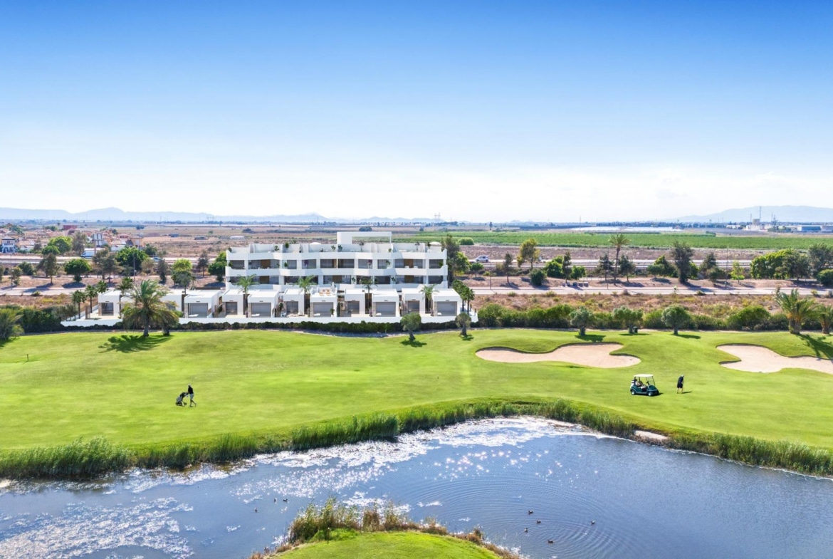 Modern two-bedroom ground floor apartment with garden overlooking lush, sunlit Serena Golf course in Los Alcazares.