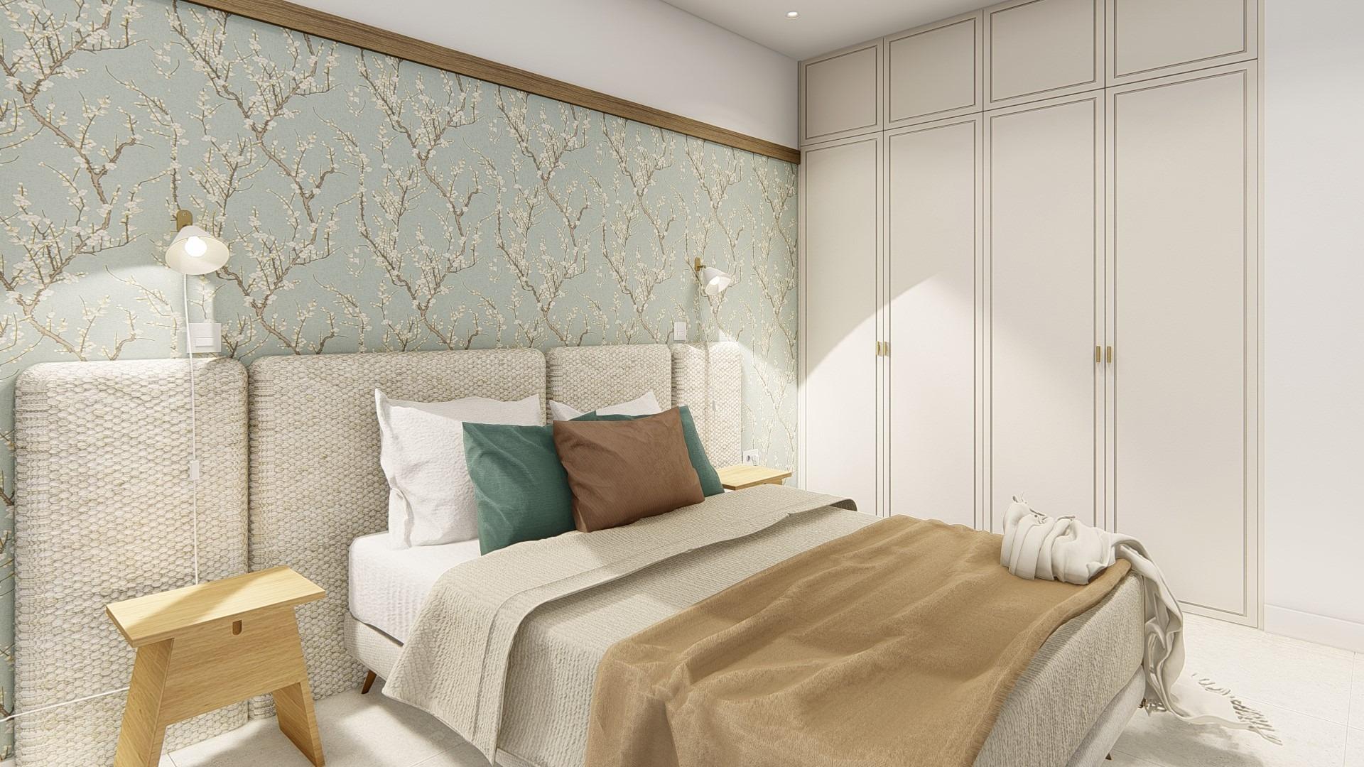 Elegant, spacious bedroom with soft textured headboard, floral accent wall, and built-in wardrobes in Dolores semi-detached villa.