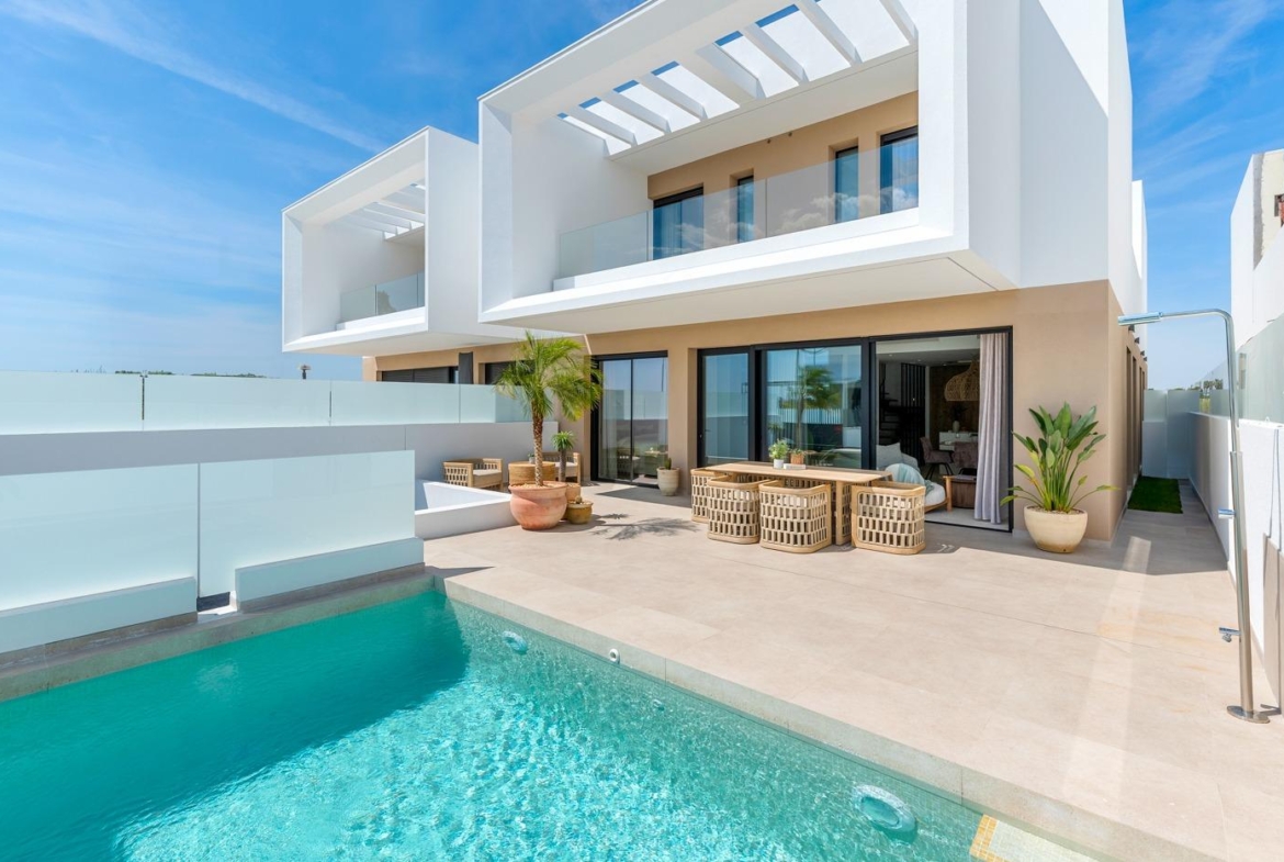Modern spacious 3-bedroom semi-detached villa with a private pool and sun-drenched terrace in Dolores, Alicante.