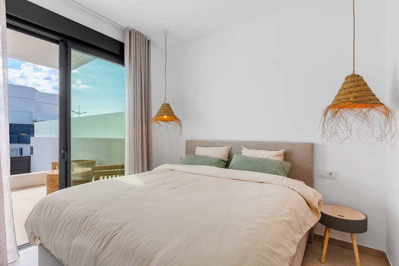 Bright and modern bedroom in a spacious 3-bedroom semi-detached villa with balcony in Dolores, Alicante.