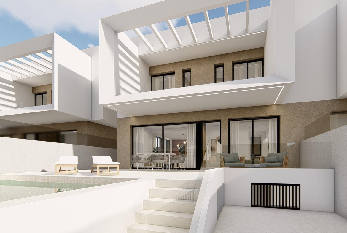 Modern spacious 3-bedroom semi-detached villa in Dolores, Alicante featuring a sunlit private pool and elegant outdoor terrace.