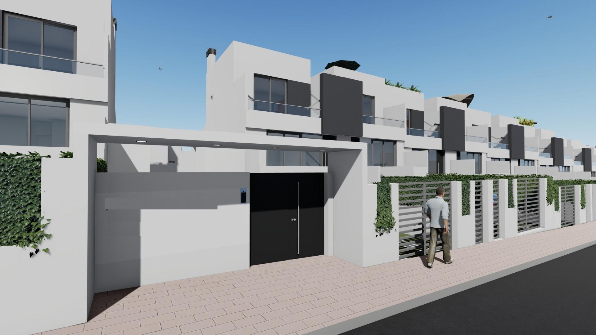 Modern white 2 bedroom townhouse with sleek design and private gated entrance in Cox, Alicante new build community.