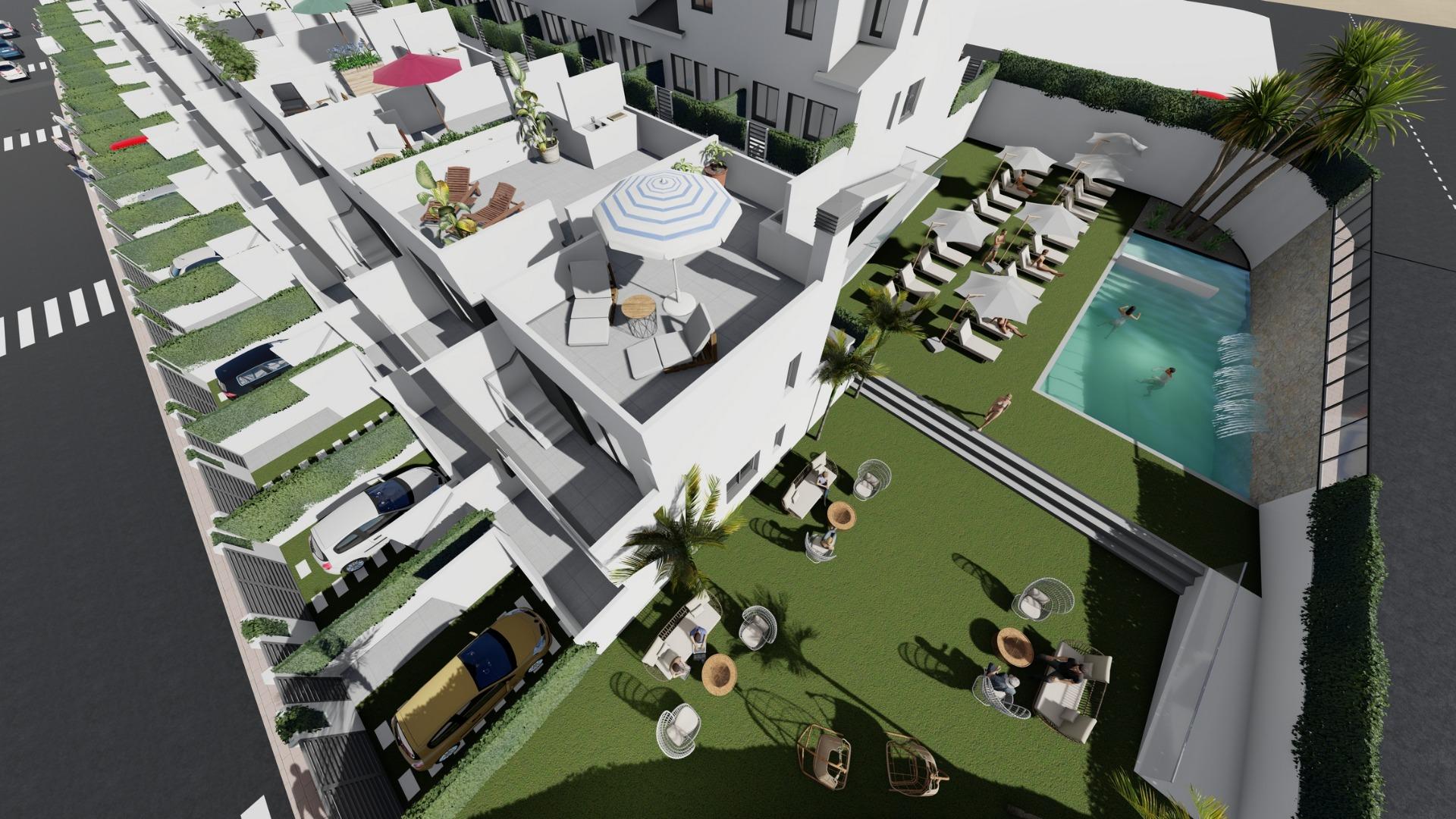 Modern spacious 3-bedroom townhouse in Cox, Alicante featuring sun-drenched solarium terraces and a landscaped communal pool area.