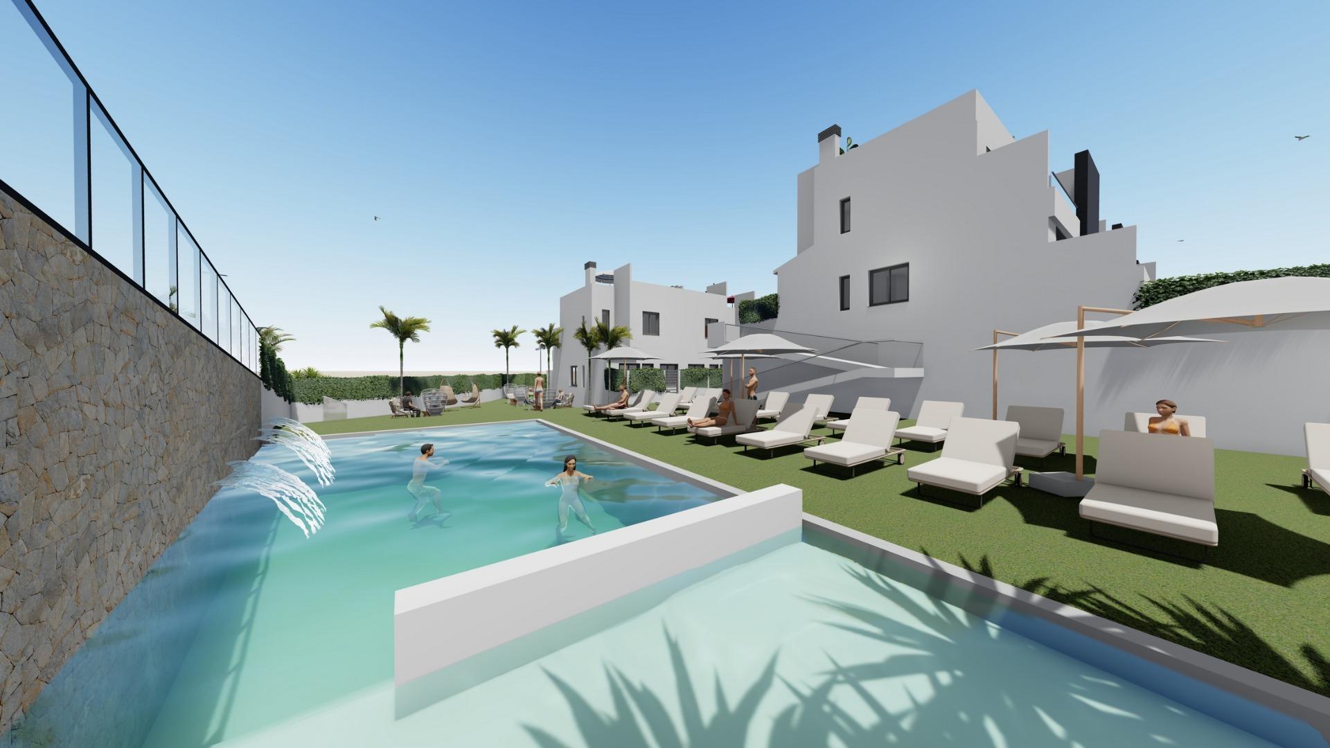 Modern new build 3-bedroom townhouse in Cox, Alicante with spacious sun-drenched communal pool and landscaped sun terrace.