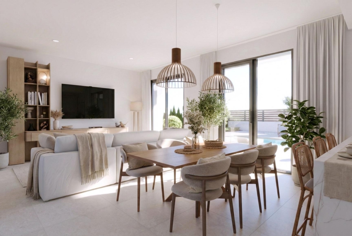 Bright open-plan living and dining area with modern furnishings and natural light in single-storey villa at Hacienda del Álamo Golf Resort Murcia