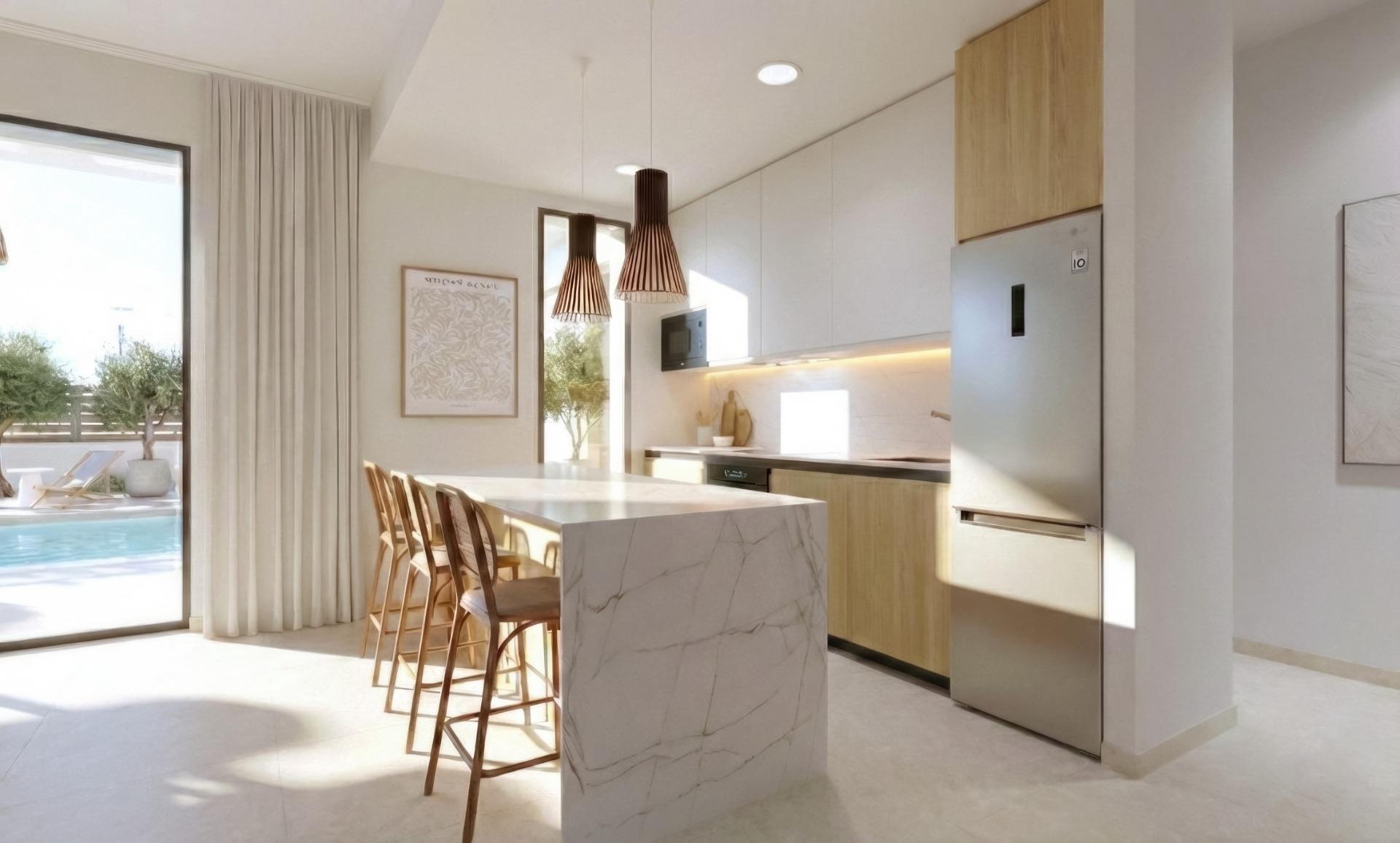 Bright modern kitchen with marble island and wooden accents in single-storey new build villa at Hacienda del Álamo Golf Resort, Murcia