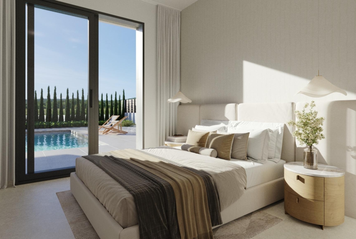 Bright and elegant bedroom with soft neutral tones and pool view in a single-storey new build villa at Hacienda del Álamo Golf Resort Murcia