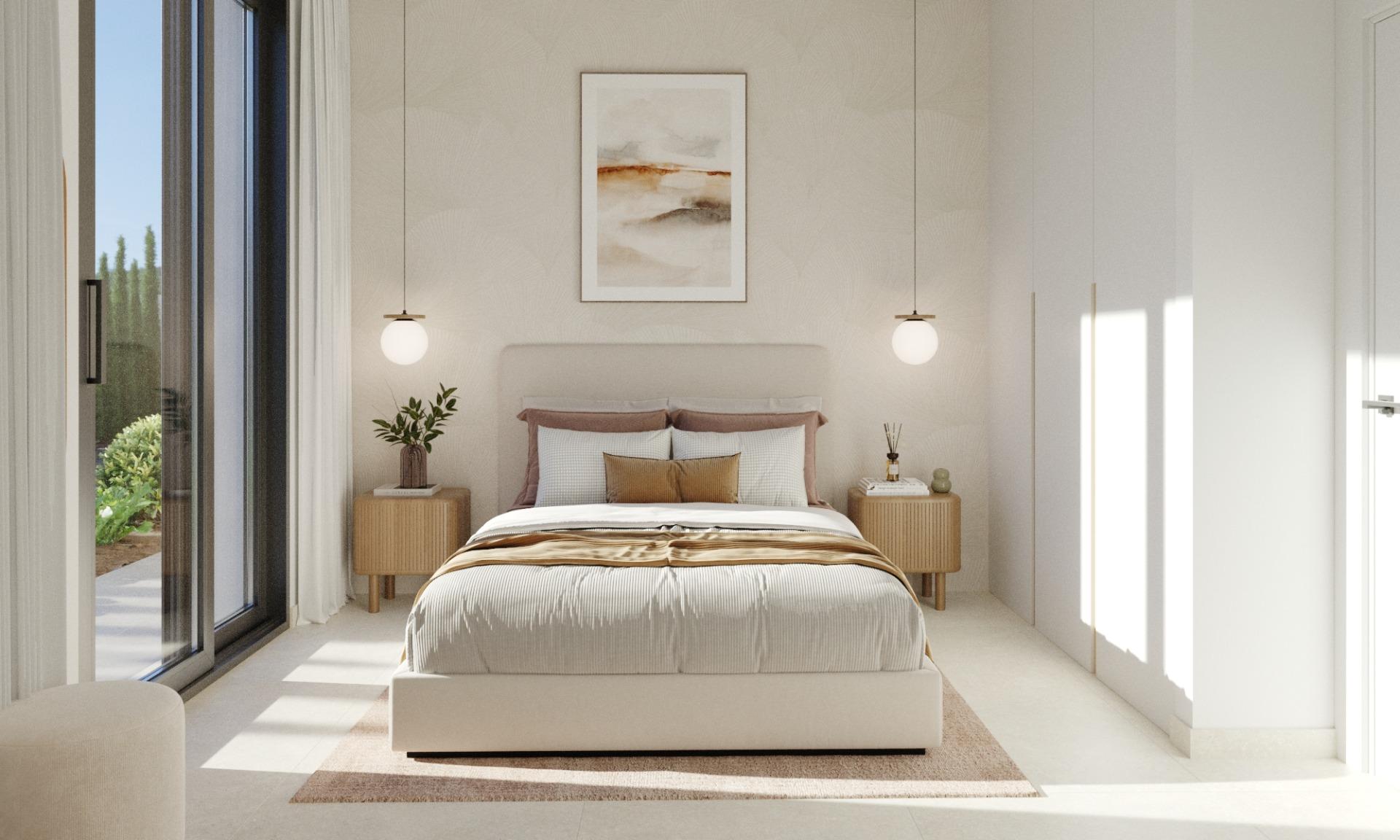 Bright, elegant bedroom with soft textiles, modern lighting, and garden views in a new single-storey villa in Hacienda del Álamo Golf Resort, Murcia.