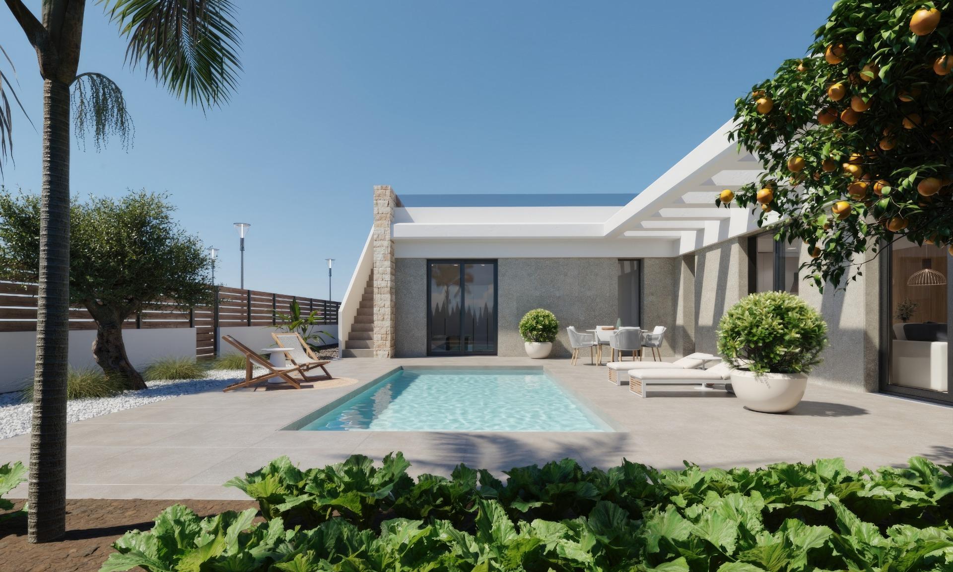 Modern single-storey villa in Hacienda del Álamo with private pool, sun-drenched terrace, lush greenery, and elegant outdoor seating.