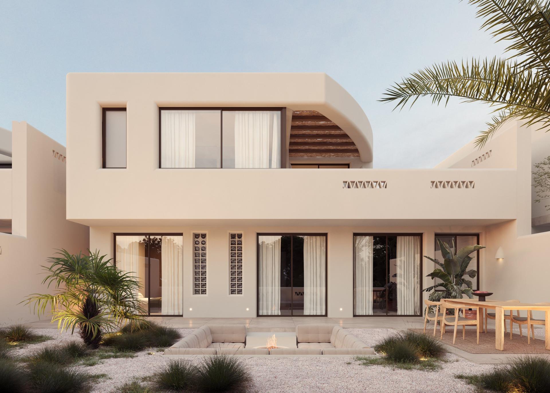 Modern sun-drenched Ibiza style villa exterior with spacious terrace and landscaped garden on La Finca Golf, Algorfa, Costa Blanca.