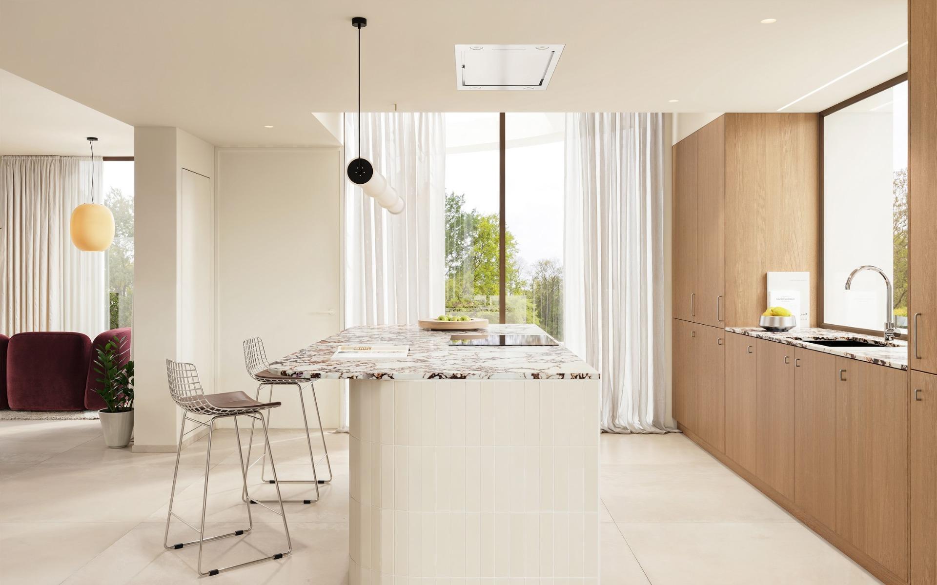 Bright modern kitchen with marble island and sleek wood cabinetry in exclusive Ibiza style villa, Algorfa Costa Blanca.