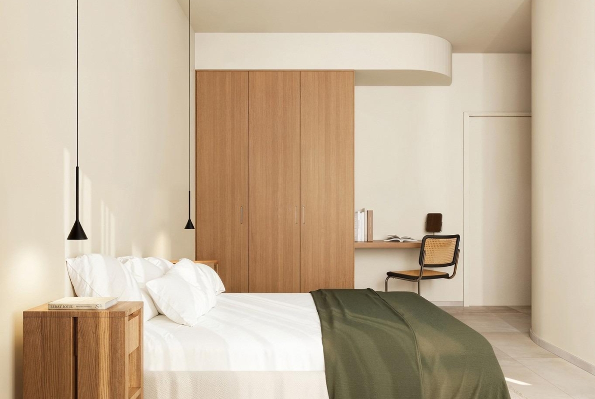 Bright, minimalist bedroom with elegant wooden accents in exclusive Ibiza style villa for sale on La Finca Golf, Algorfa.