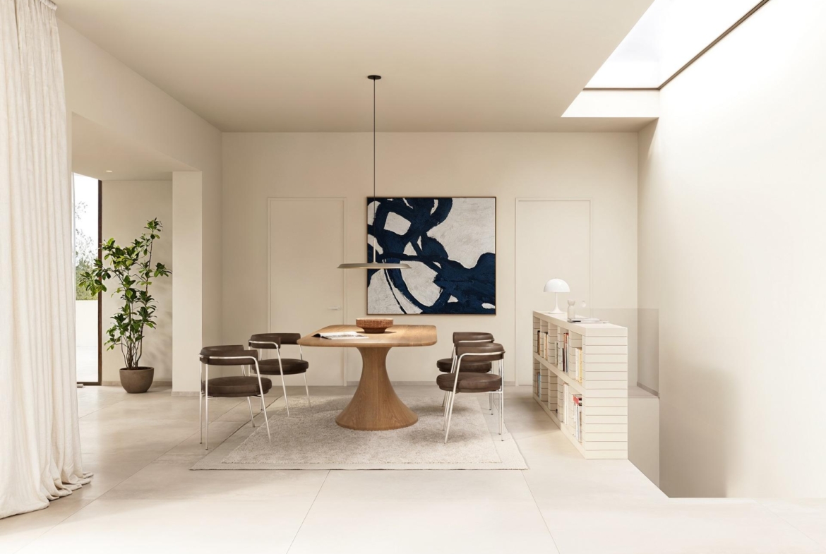 Bright, minimalist dining area with natural light and chic furniture in luxury 4-bedroom Ibiza style villa, Algorfa Costa Blanca.