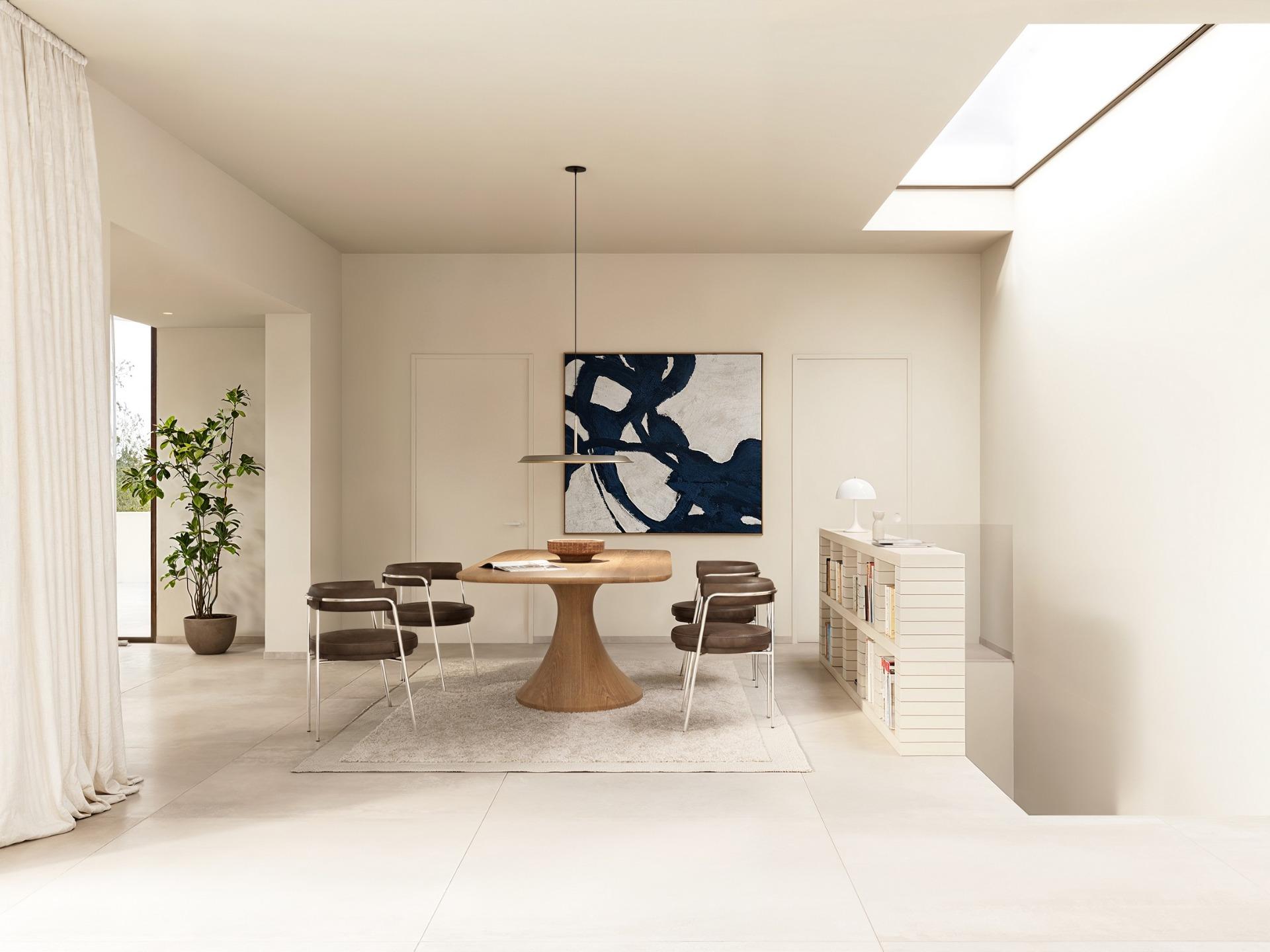Bright, minimalist dining area with natural light and chic furniture in luxury 4-bedroom Ibiza style villa, Algorfa Costa Blanca.